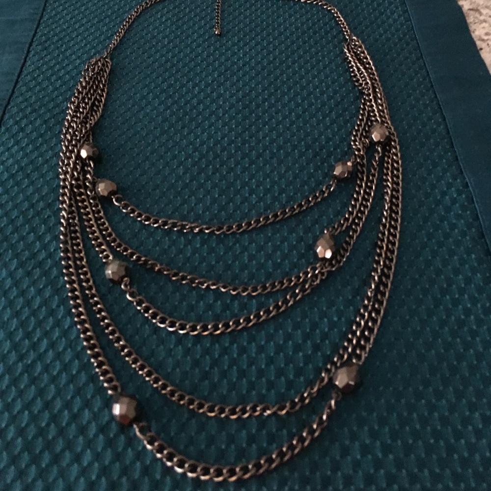 5 layer dark silver necklace.